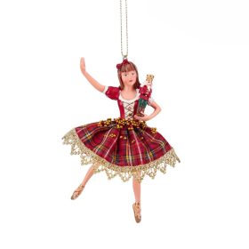 Marie kockás ruhában diótörővel